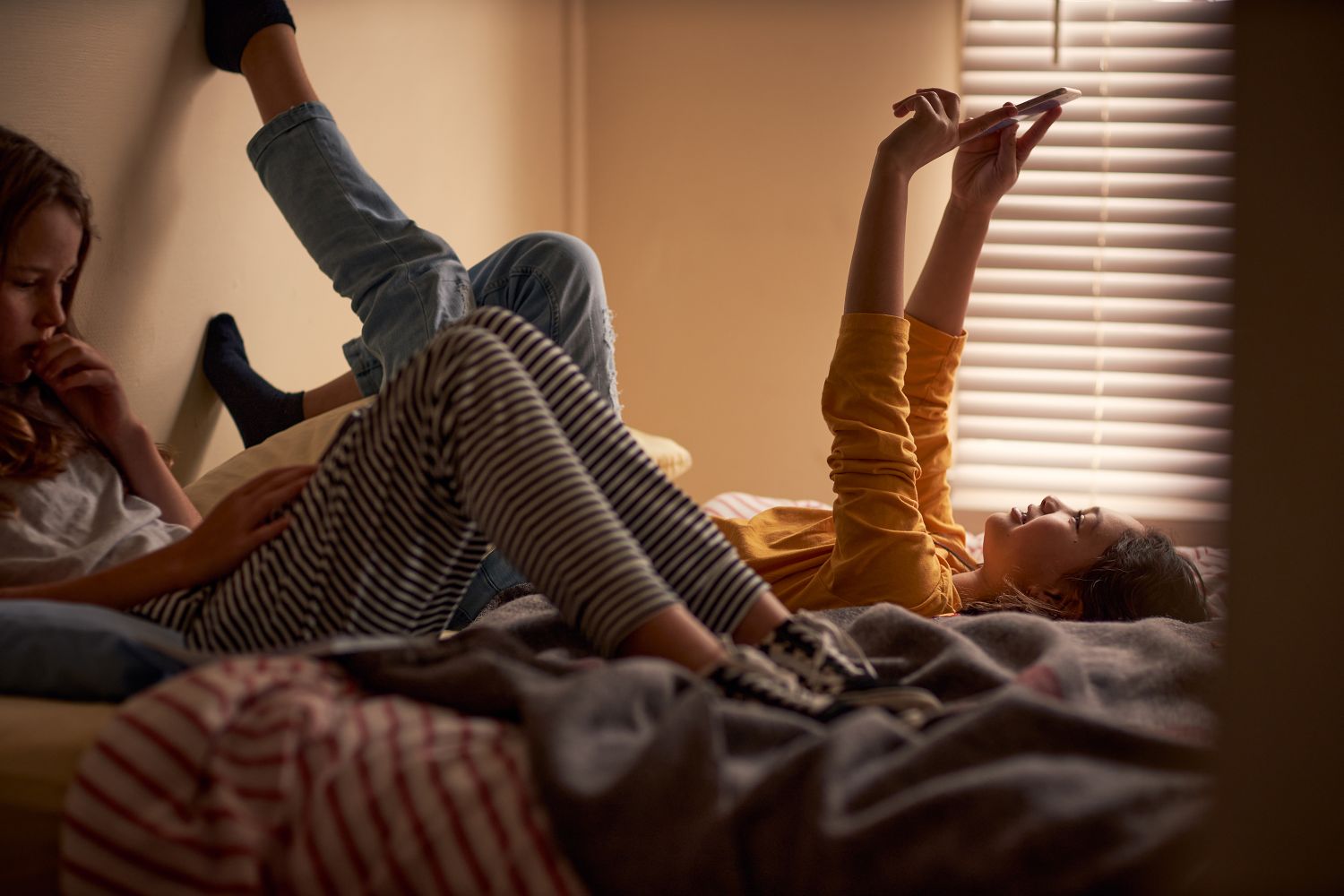 Kids resting with tablets