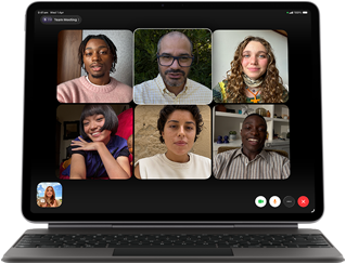 iPad Air, attached to Magic Keyboard, Black colour, Group FaceTime call on screen