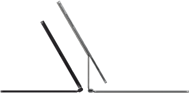 Two iPad Pro devices attached to Magic Keyboard, side exterior, thin profile, space black colour with speakers and USB-C port, tilted half open, silver colour, open, tilted back showing the keyboard’s floating cantilevered design, speakers and microphone