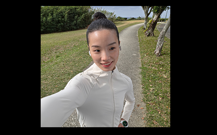 A selfie of someone. AI ensures shadows and highlights are accurately captured.