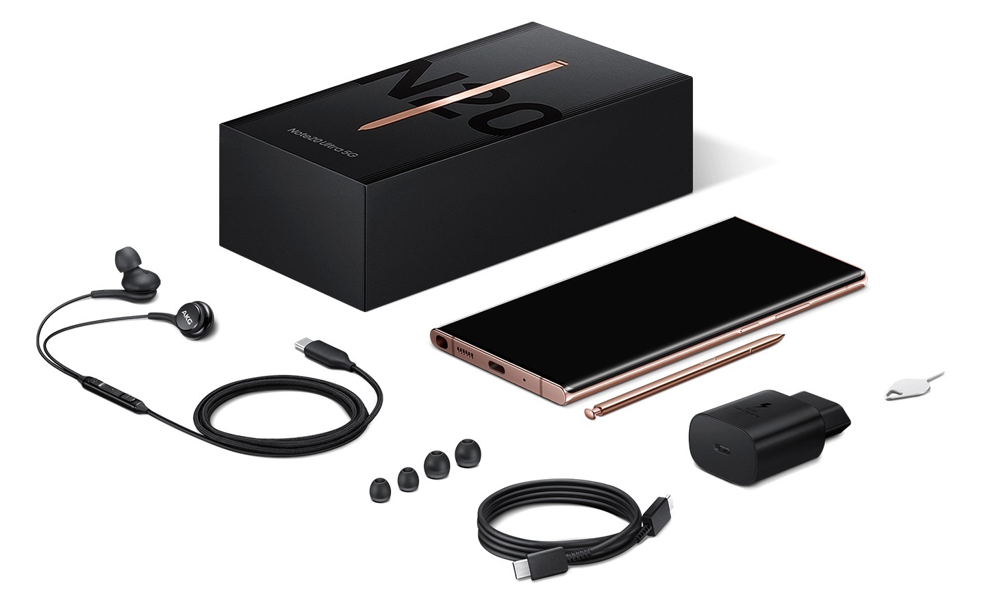 Beautiful black box for with its content layout out beside it, placed symmetrically. Items include: A Samsung Galaxy Note20 mobile device, charger and cable, earphones with replacement buds, an S pen and a clear case.