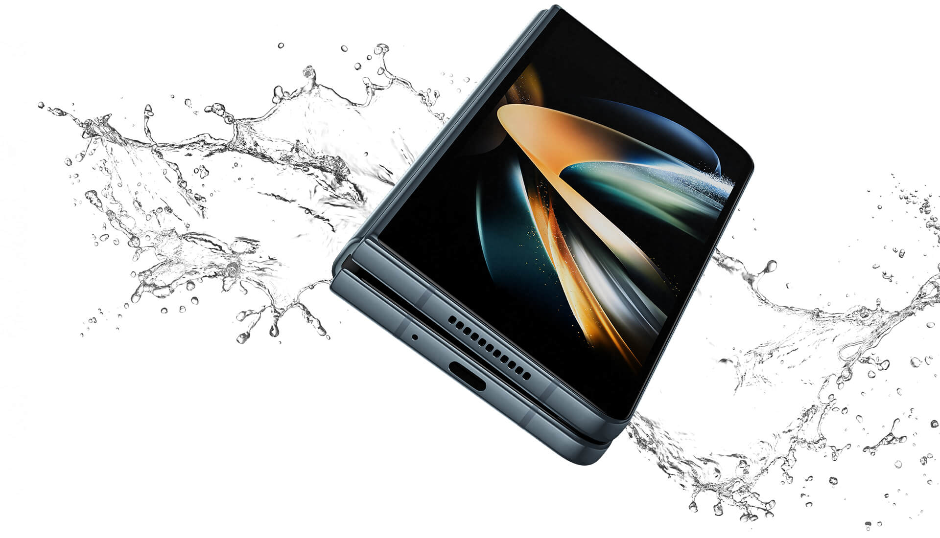 Samsung Galaxy Z Fold4, folded with screens outwards and fully flexed in the air, splashed with dramatic water effects. Equipped with IPX8 water resistance, Z Flip4, a part of the first water resistant foldable smartphone series.