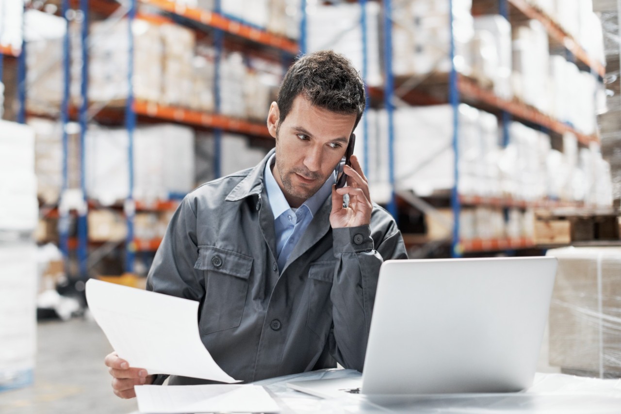 Man on a phone call in a warehouse